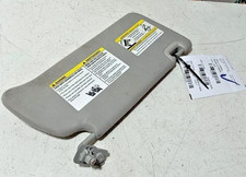 2013-2021 Nissan Frontier Driver Side Sun Visor Gray w/o Light OEM/Wrnty picture