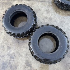 SET OF TWO REAR CARLISLE AT489 25x10.00-12NHS GOOD TREAD OEM picture
