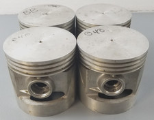 4 New NOS Ford Pistons BB-6110-CR .040 Oversize 1928-34 Model A & B Cyl picture