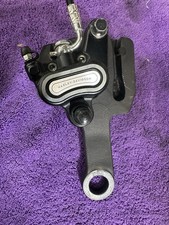 18-25 Harley Softail S , Fat Bob FXFBS OEM Rear Back Brake Caliper w/ Bracket picture