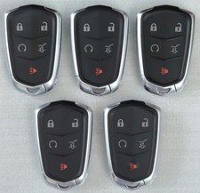 Used  Lot of 5 OEM Cadillac 5-Button Smart Key Fobs picture