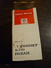 NOS DELCO REMY 10499817 IGNITION COIL MOUNTING BRACKET picture