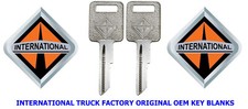OEM 2 ORIGINAL INTERNATIONAL TRUCK FACTORY KEY BLANKS WHITE LOGO. picture