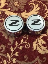 1981-1982-1983 Datsun 280ZX wheel center caps pair 40343-P9500 OEM picture