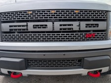 Gen 1 Ford Raptor (PACKAGE) emblem and Tow Hook Cover set picture