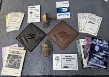 vintage Kiekhaefer Mercury outboard floor tiles + prop, shield & misc literature picture