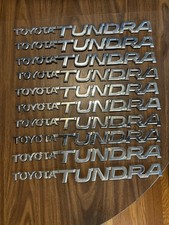 One 2000-2006 TOYOTA TUNDRA SIDE DOOR REAR TAILGATE CHROME EMBLEM BADGE NAME OEM picture