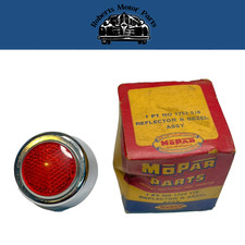 New Old Stock Tail & Stop Reflector w/ Bezel for 1957–58 Dodge Suburban #1753518 picture