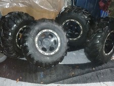 Itp 26X11.00R12 NHS 80f Mud Terrain and Itp Rims Black picture