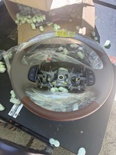 2003 Ford king ranch leather wrapped steering Wheel, With cruise control Buttons picture