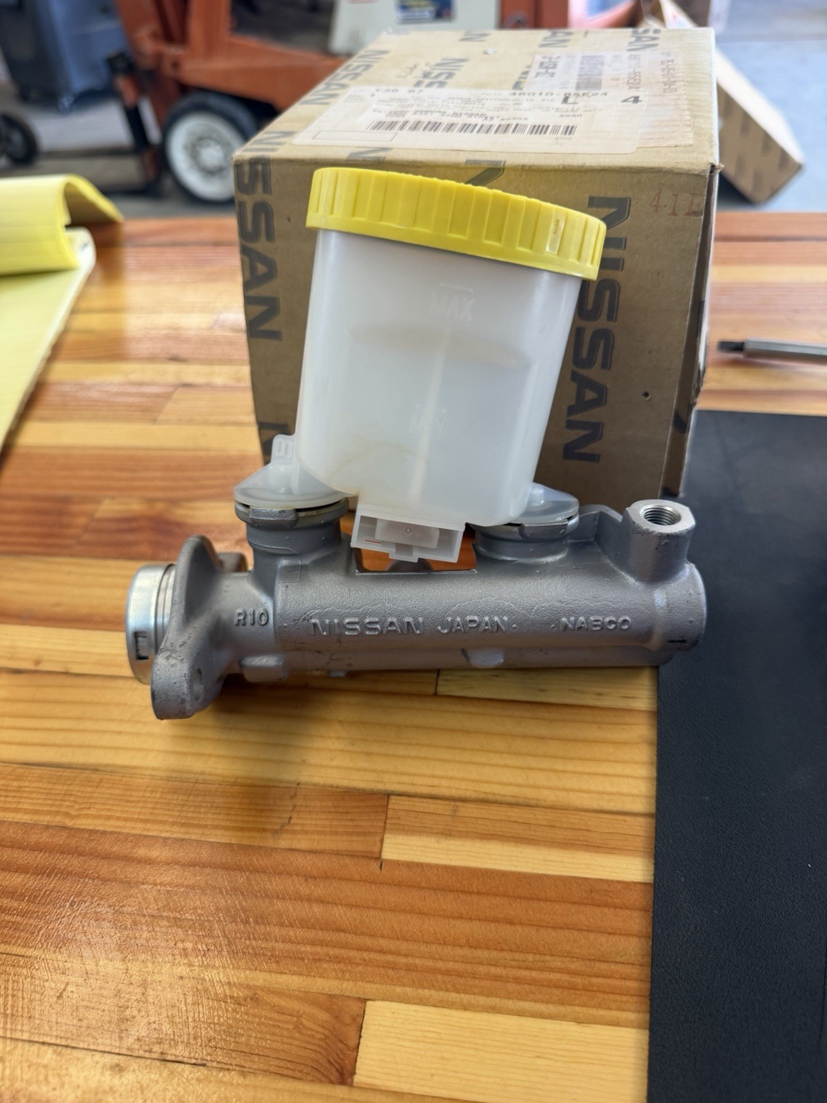 ￼Nissan OEM 46010-85E24 Brake Master Cylinder
