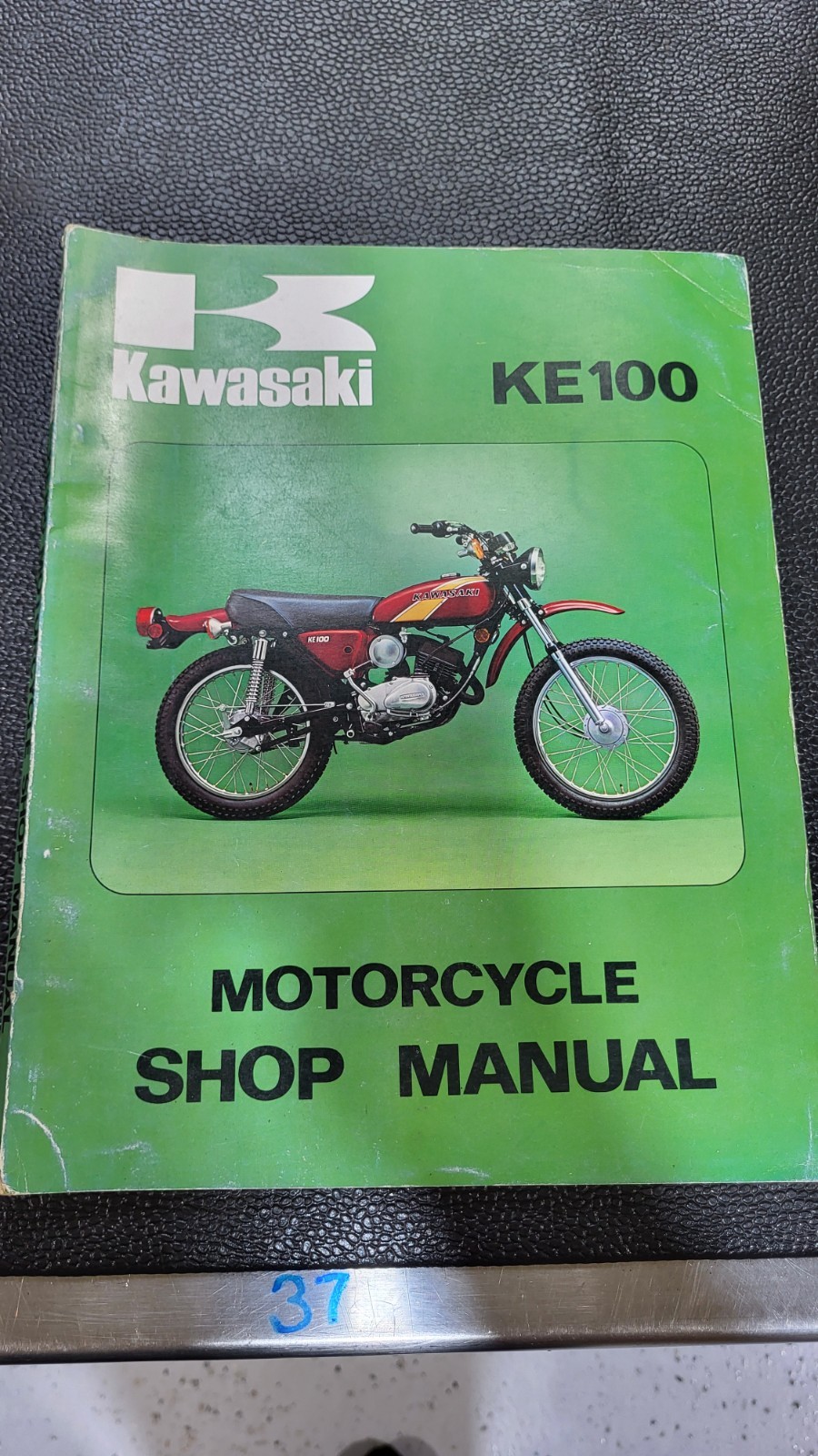 1971 + Kawasaki KE100 G5 Shop Manual Catalog Part # 99997-74801 Authentic