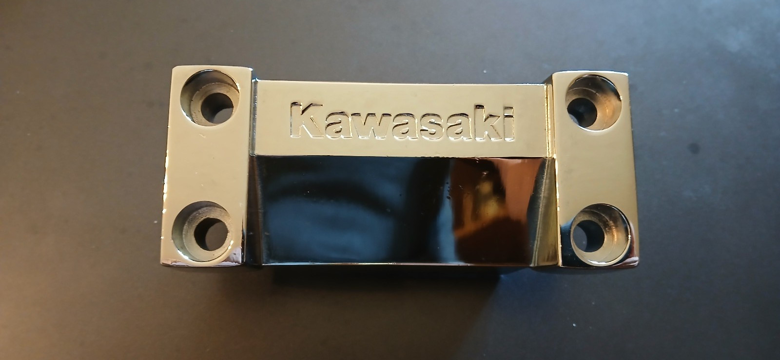 1986-2006 Kawasaki VN750 Vulcan OEM Handlebar Clamp \'NOS\' 1986-2006 Kawasaki VN750 Vulcan OEM Handlebar Clamp \'NOS\'