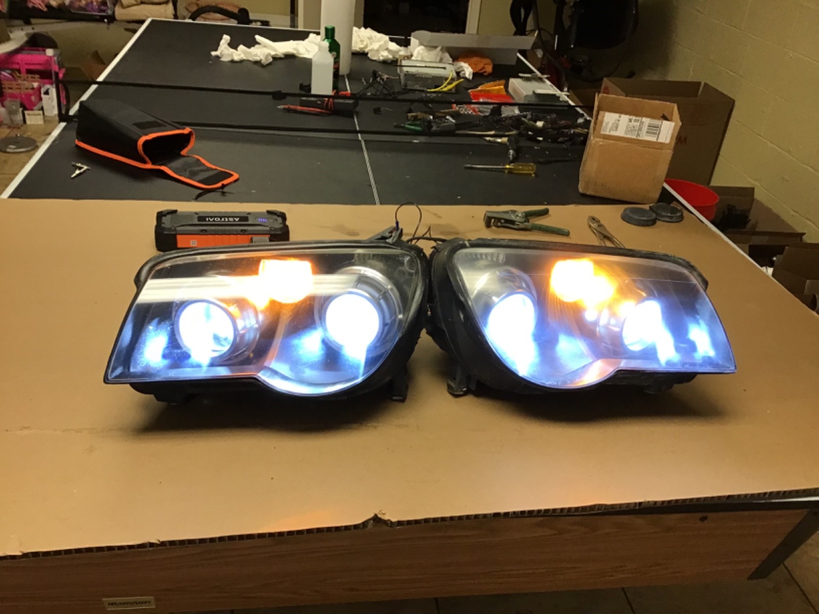 chrysler crossfire left/right headlight w/bulbs and dust covers TESTED chrysler crossfire left/right headlight w/bulbs and dust covers TESTED