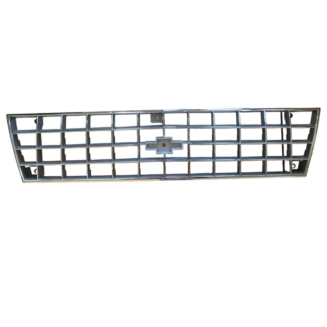 84-87 CHEVY CAVALIER grill CHROME TRIM   14067089