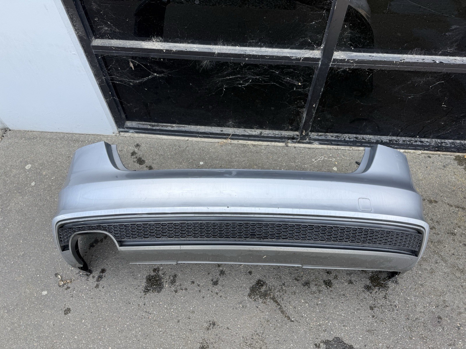 2013-2016 Audi A4 B8.5 Rear Bumper Cover Assembly Silver OEM. SH 2013-2016 Audi A4 B8.5 Rear Bumper Cover Assembly Silver OEM. SH