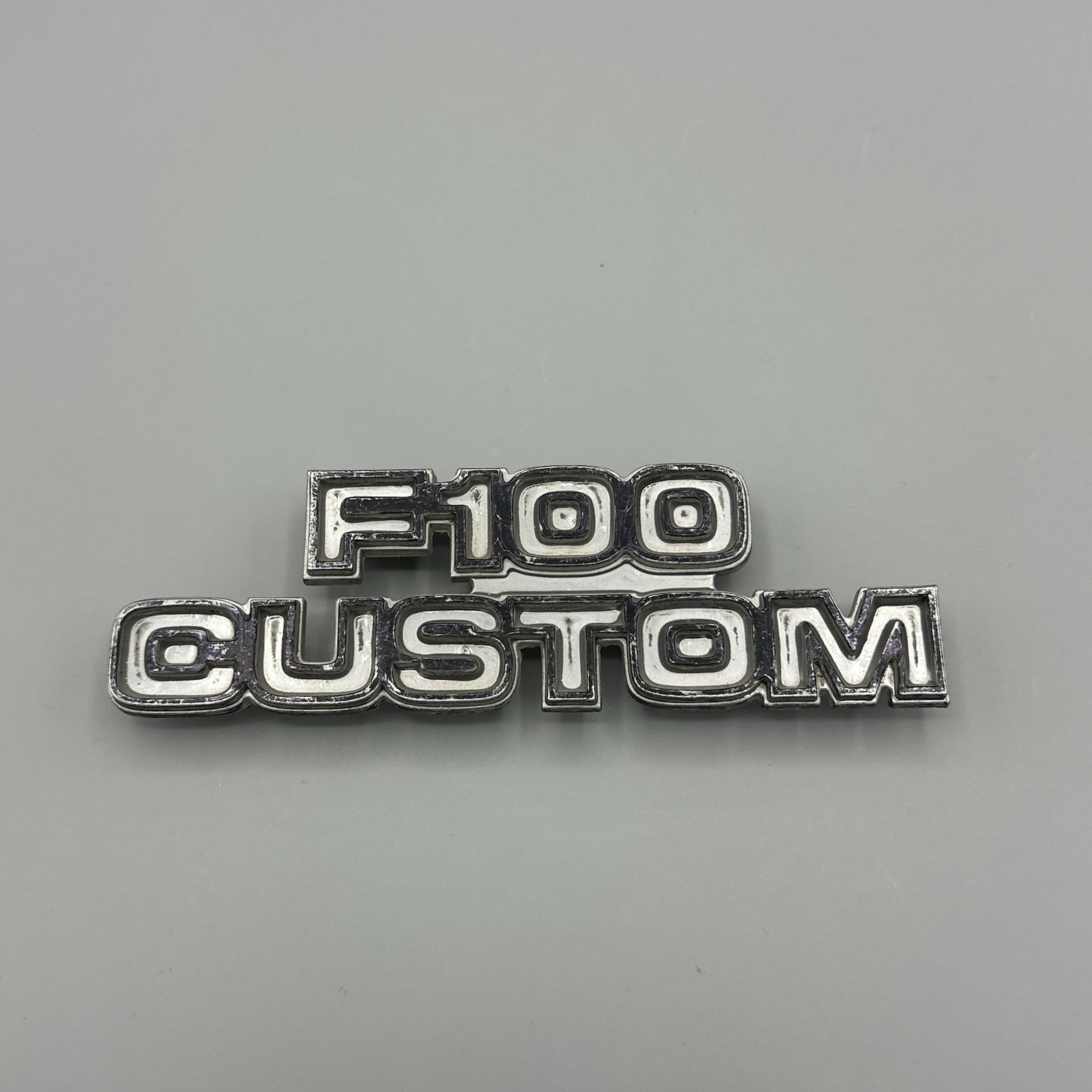 Vintage 1977-1979 Ford F100 Custom Emblem OEM Truck Badge Vintage 1977-1979 Ford F100 Custom Emblem OEM Truck Badge