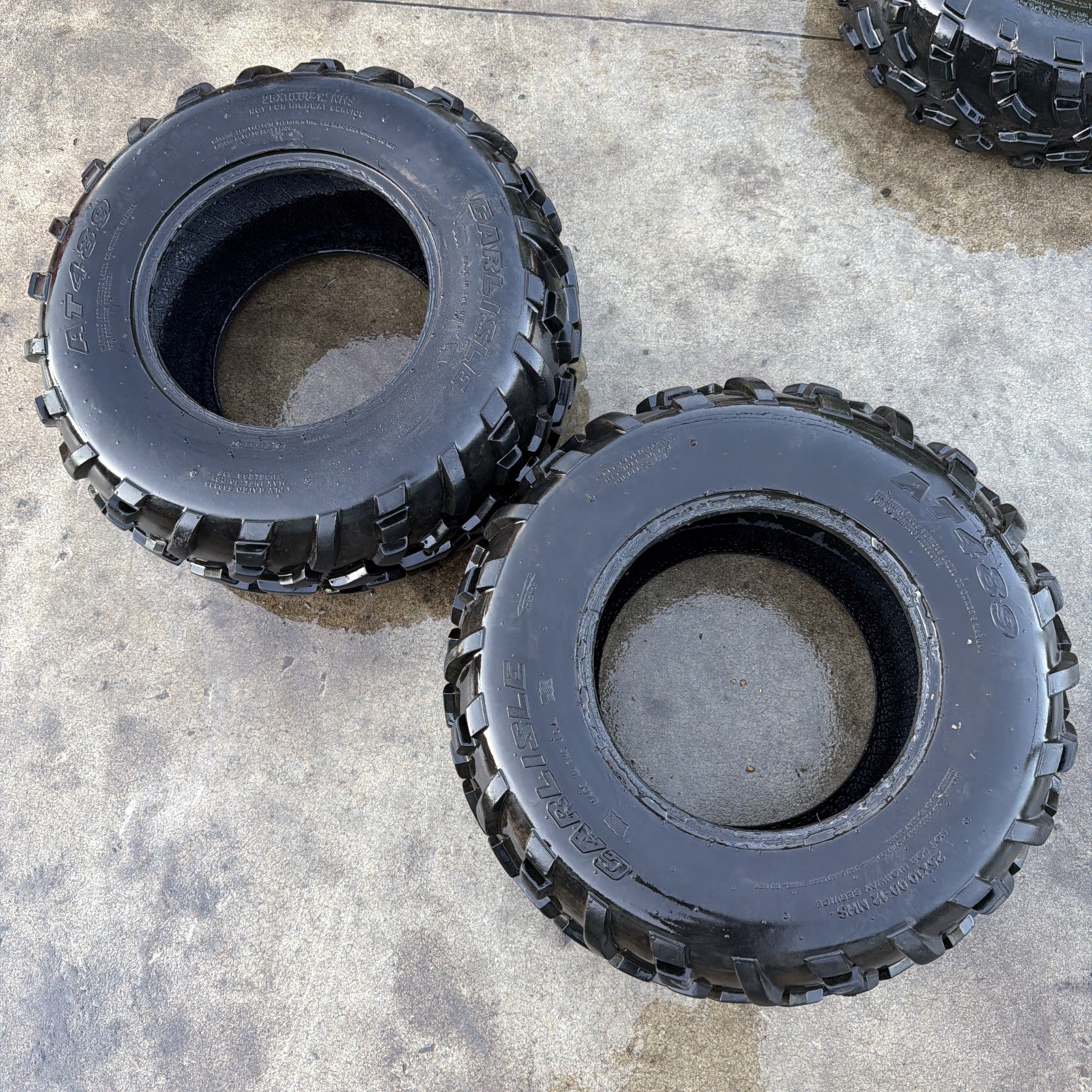 SET OF TWO REAR CARLISLE AT489 25x10.00-12NHS GOOD TREAD OEM SET OF TWO REAR CARLISLE AT489 25x10.00-12NHS GOOD TREAD OEM
