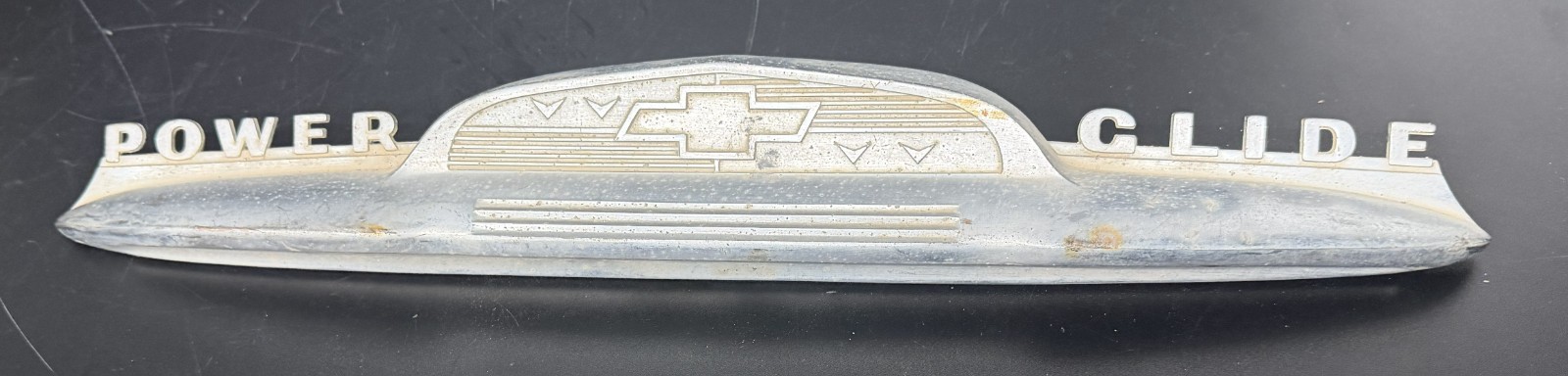 vintage 1951–1952 Chevrolet Powerglide trunk emblem and handle