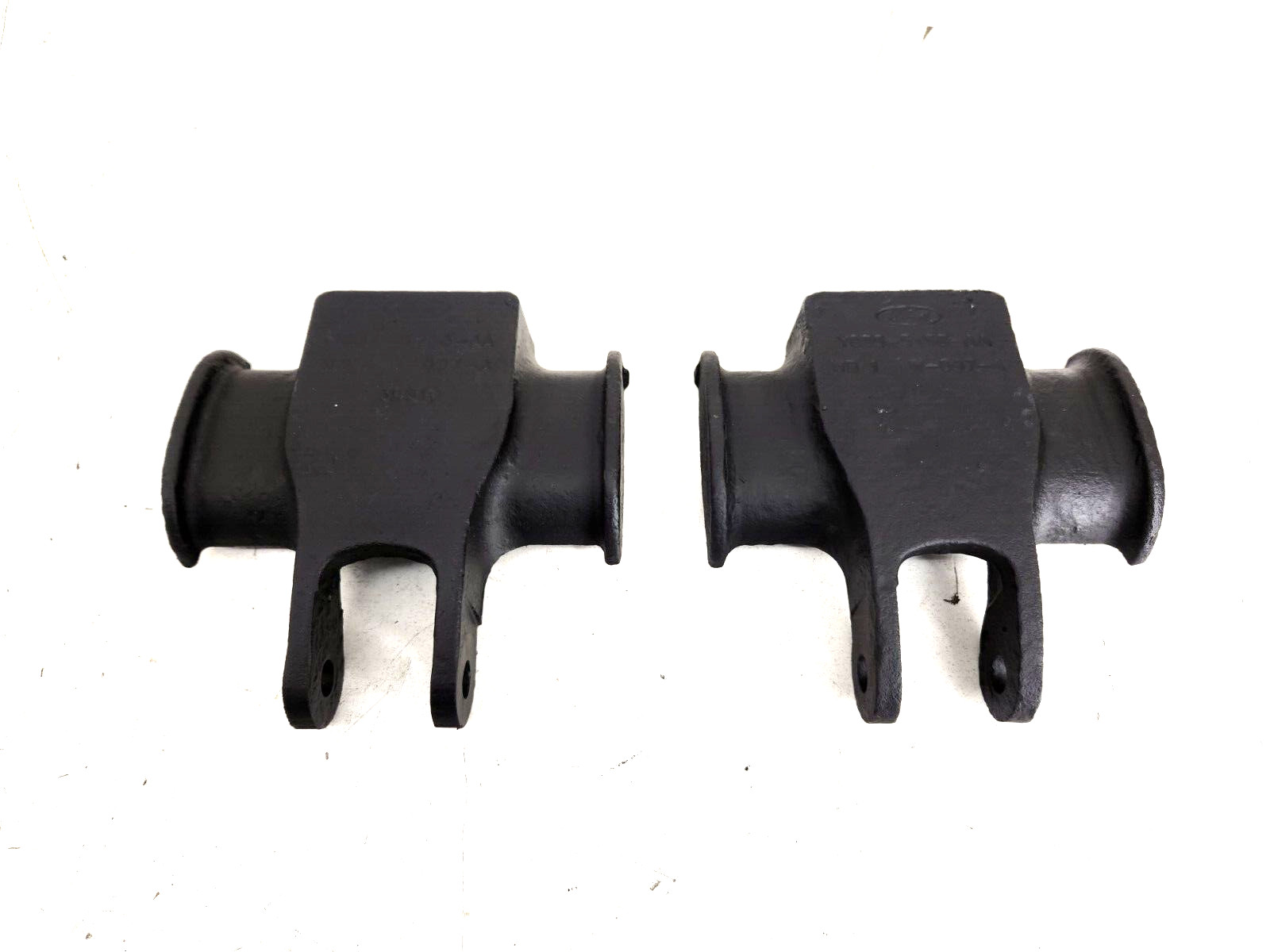 1999-04 Ford F250 F350 F450 F550 Front Axle Lower Shock Mount OEM set of 2