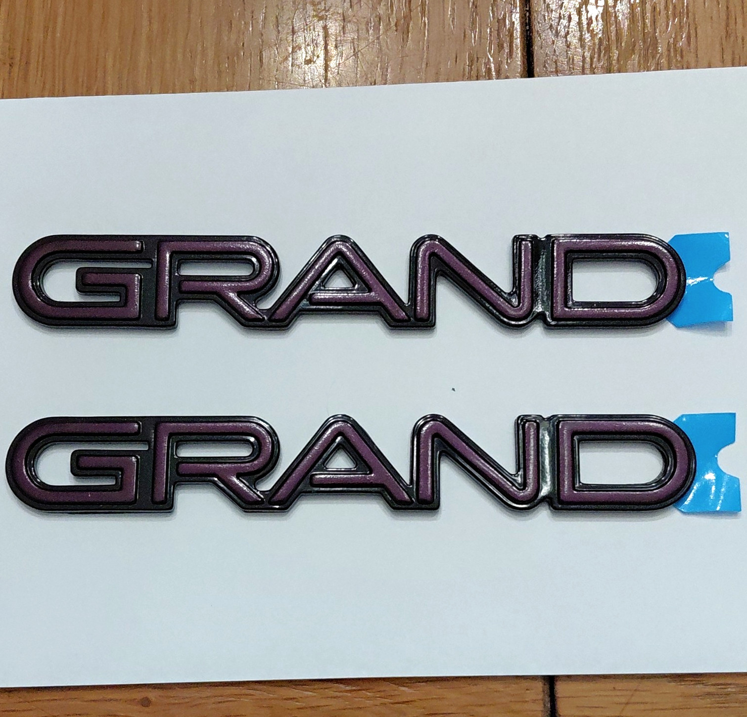 1989 - 1995 Pontiac Grand Am PURPLE GRAND EMBLEMS Pair Of 2 NOS GM Pieces 1989 - 1995 Pontiac Grand Am PURPLE GRAND EMBLEMS Pair Of 2 NOS GM Pieces
