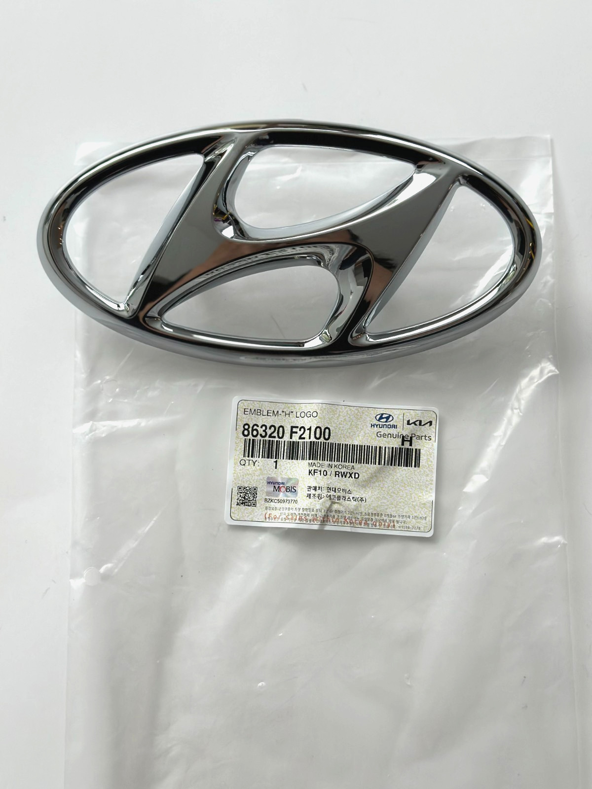 GENUINE OEM FRONT GRILLE CHROME LOGO BADGE 86320-F2100 for 17-18 Hyundai Elantra