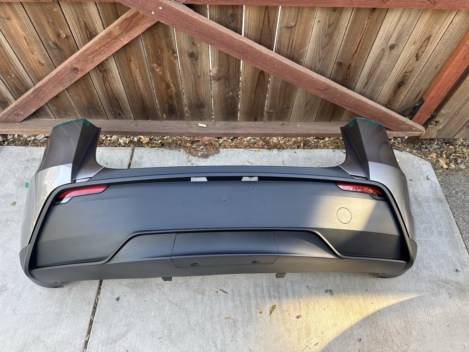 2025–2027 Tesla Model Y Juniper OEM Rear Bumper – Quick Silver – Brand New