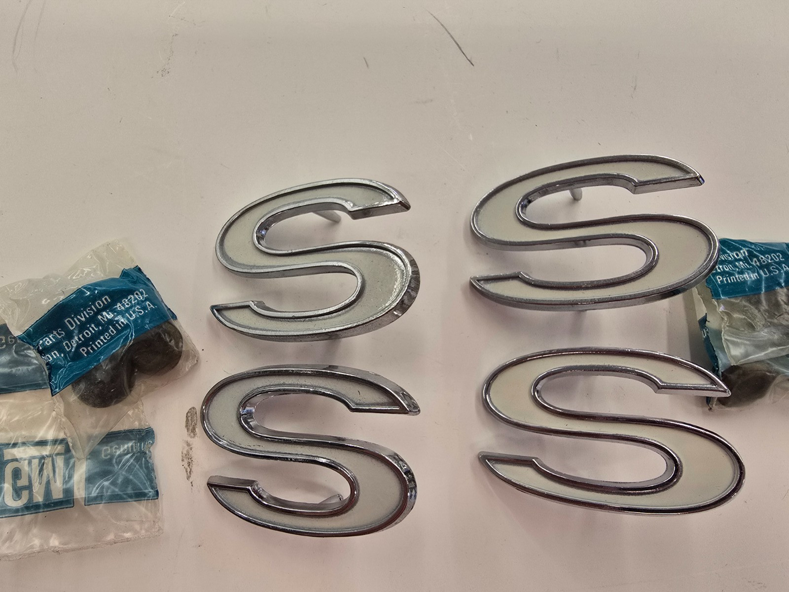 69-72 NOS Chevelle SS White Fender Side Emblems - 2 Pair # 3949238 NEW 69-72 NOS Chevelle SS White Fender Side Emblems - 2 Pair # 3949238 NEW