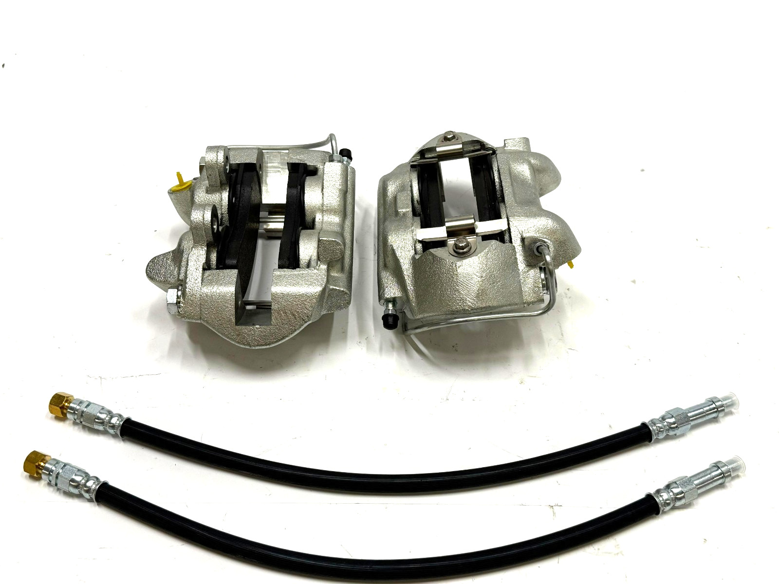 1964-1967 mustang 4 piston calipers Kelsey Hayes style with hoses 1964-1967 mustang 4 piston calipers Kelsey Hayes style with hoses
