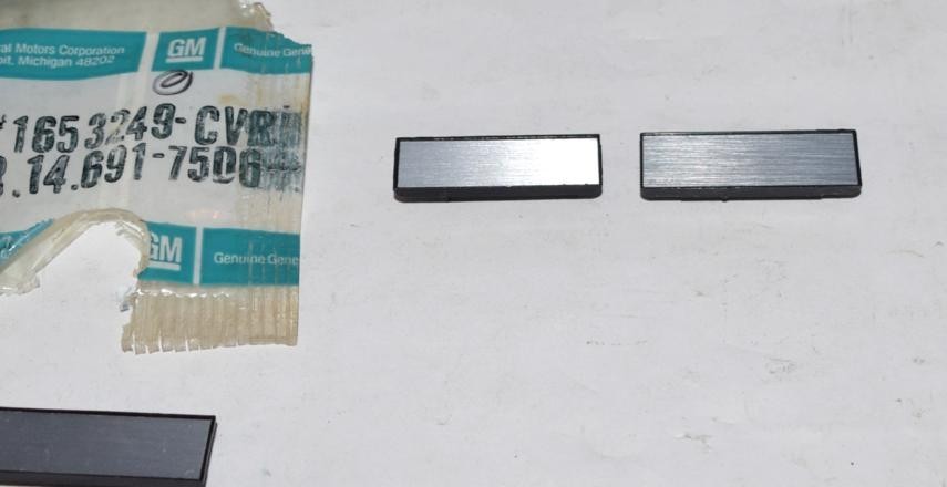 NOS 1974-1976 CHEVY MONTE CARLO CUTLASS DOOR PULL STRAP END COVERS PAIR 1653249