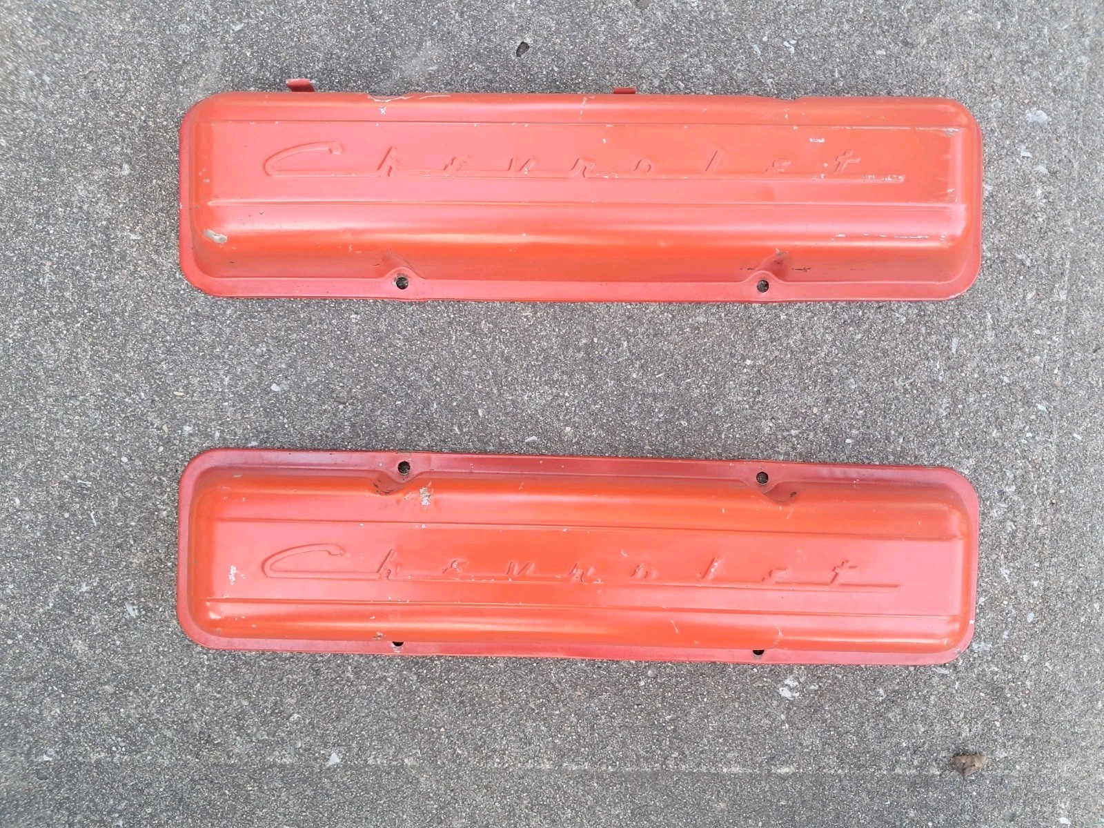 Two Vintage Chevrolet spell-out script valve covers.