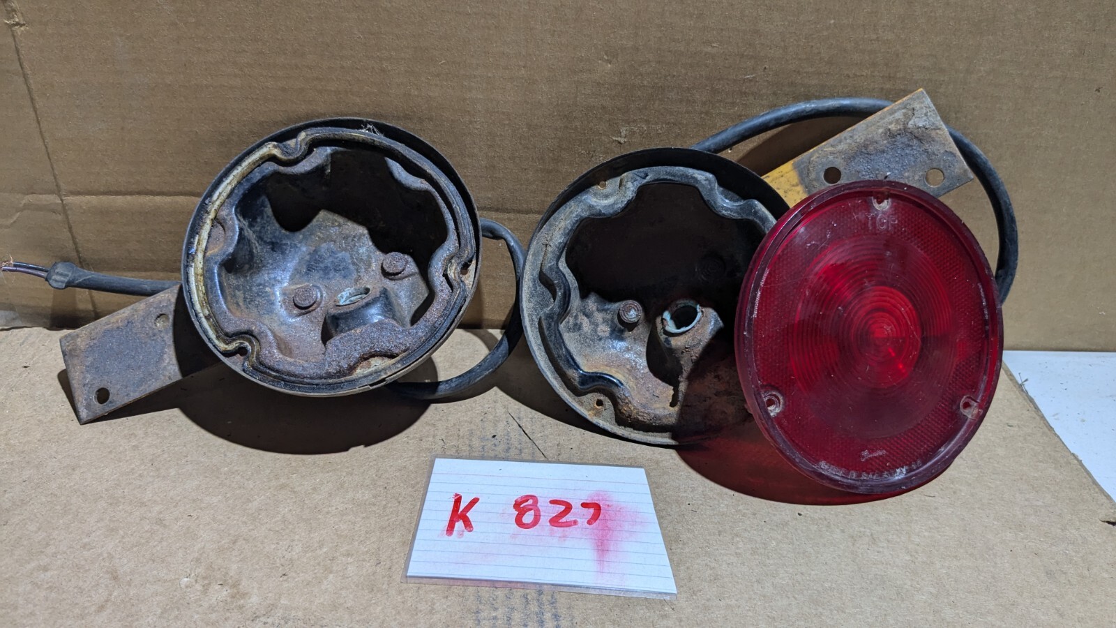 1965-70 ORIGINAL CHEVY TRUCK TAIL LIGHT HOUSING WITH BRACKETS AND ONE LENS 1965-70 ORIGINAL CHEVY TRUCK TAIL LIGHT HOUSING WITH BRACKETS AND ONE LENS