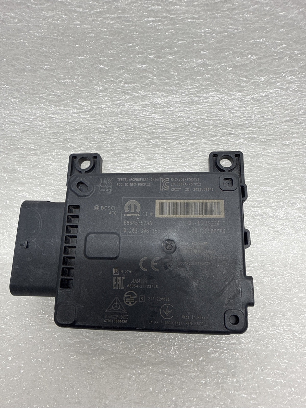Genuine Mopar Adaptive Cruise Control Distance Radar Sensor 68645752AA OEM Genuine Mopar Adaptive Cruise Control Distance Radar Sensor 68645752AA OEM