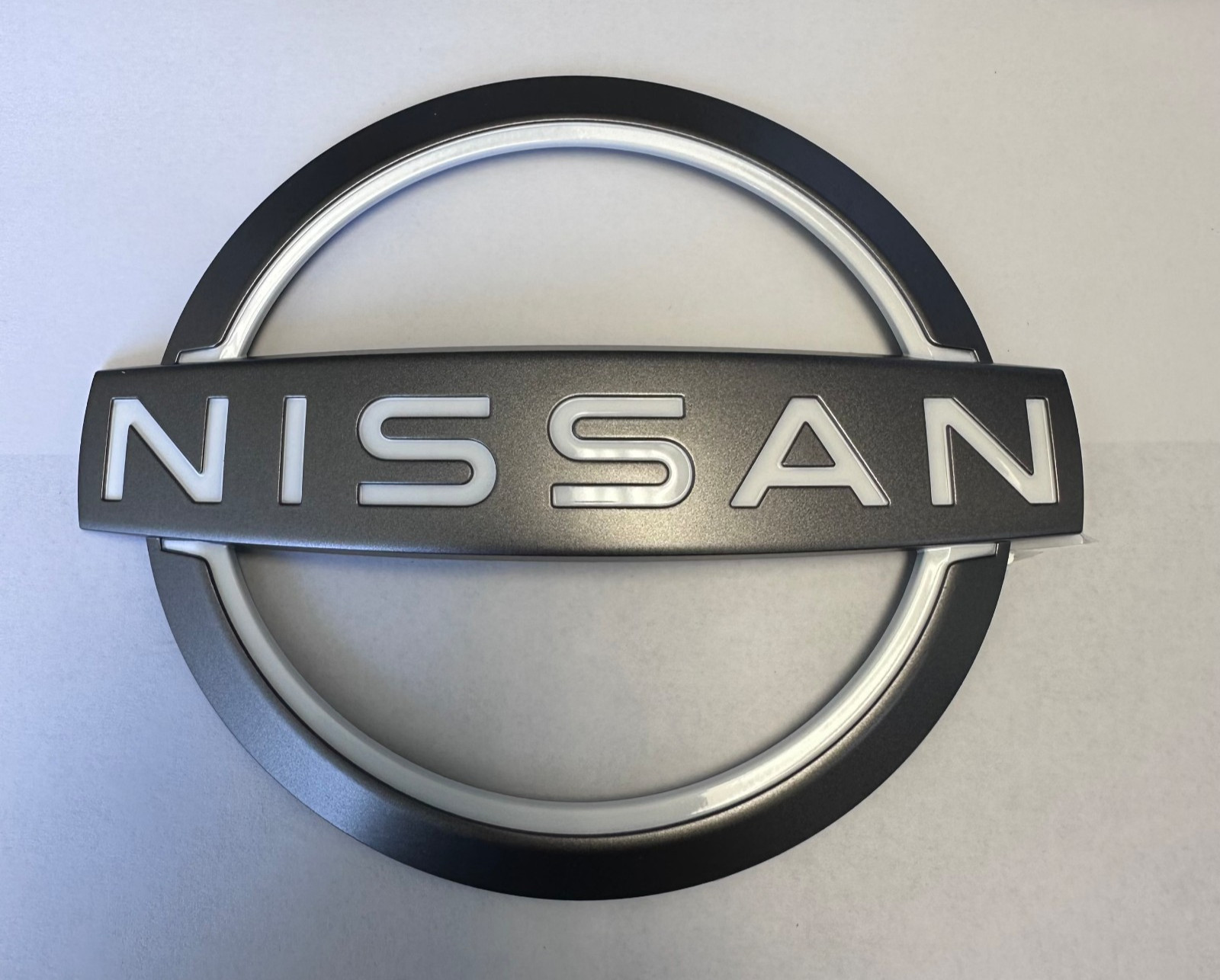 2025-2026 NISSAN KICKS FRONT EMBLEM LOGO BADGE ORNAMENT OEM