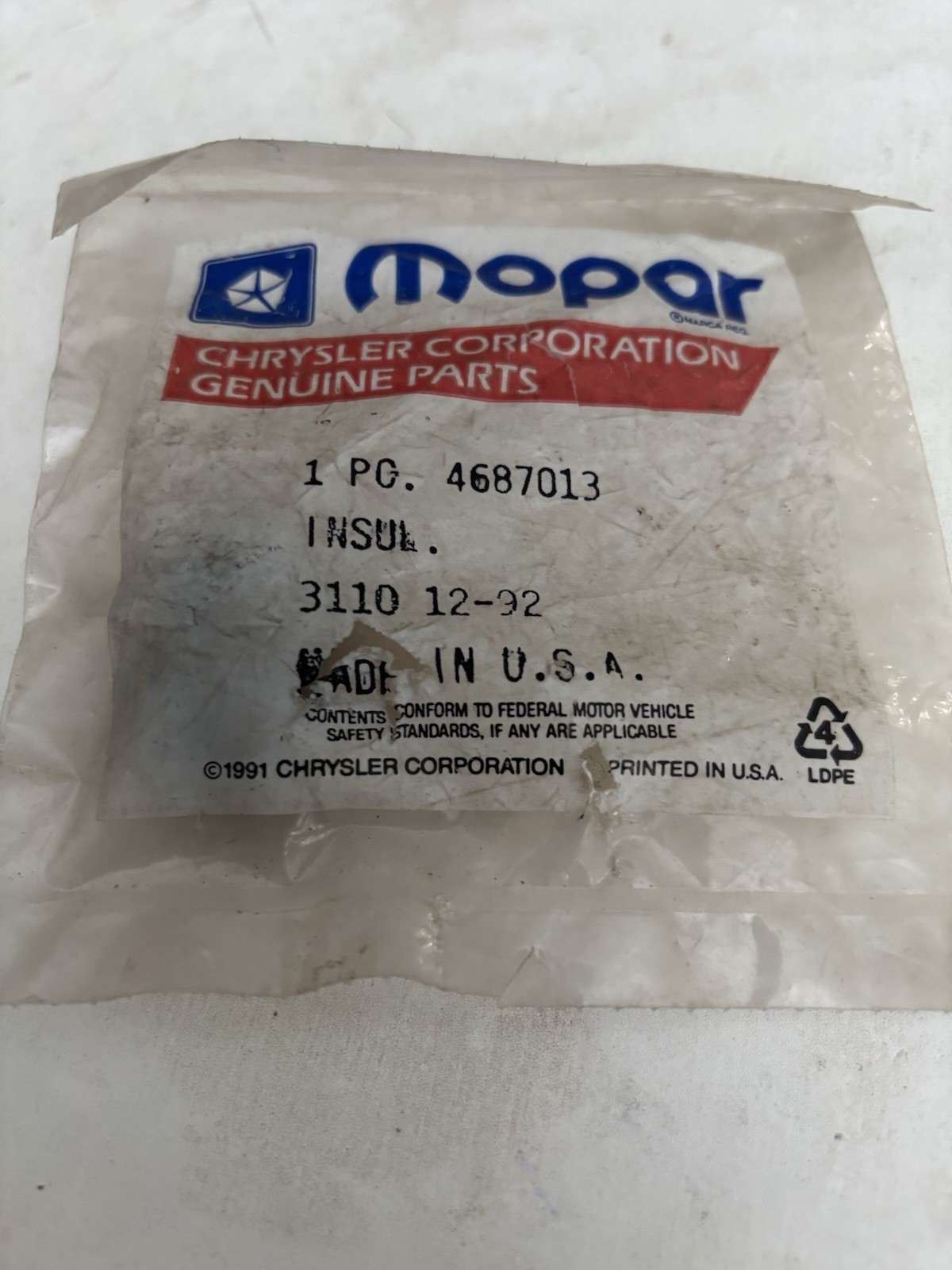 MOPAR NOS 4687013 HEAD OR FOG LIGHT INSULATOR  90s DODGE SPIRIT CHRYSLER LEBARON