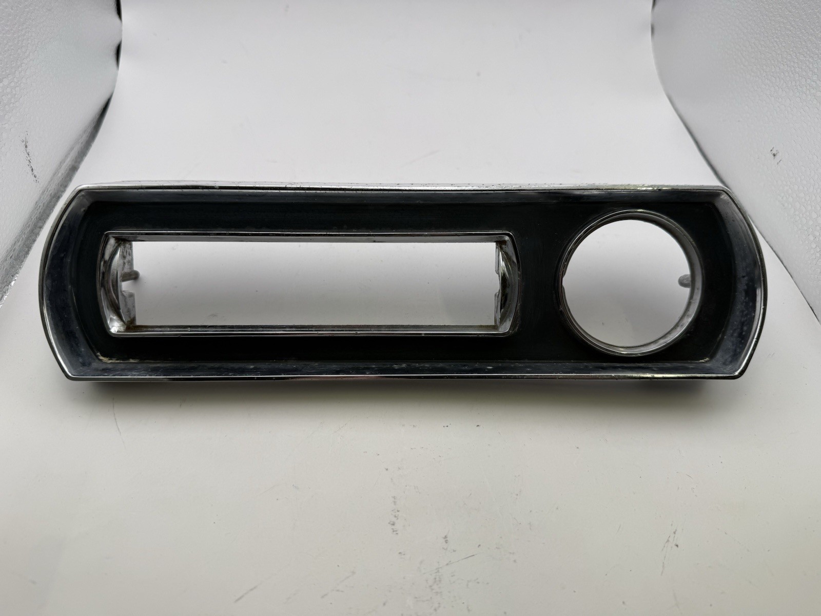 1960’s Pontiac OEM Used Vintage full-size dash vent/clock bezel casting #9774117 1960’s Pontiac OEM Used Vintage full-size dash vent/clock bezel casting #9774117
